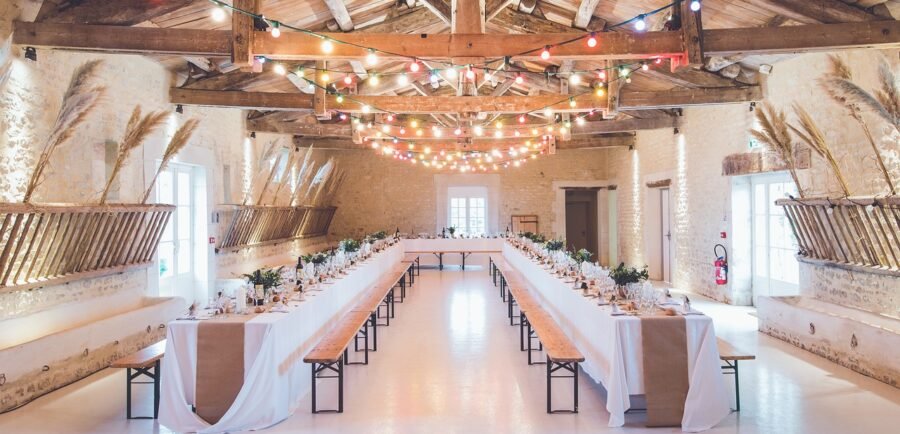 events, venue, banquet, hall, wedding, party, lights, wood, beams, benches, table, spread, eat, dine, brown light, brown wood, brown wedding, brown party, brown table, brown event, brown eating, brown lights, events, events, venue, venue, banquet, banquet, banquet, banquet, banquet, wedding, party